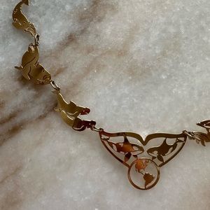 Rare collectible 14k gold plated Wild Bryde sea mammal, marine mammal necklace